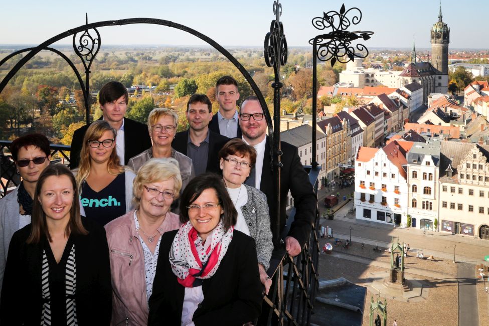 Das Team von Freund & Partner Wittenberg auf der Stadtkirche